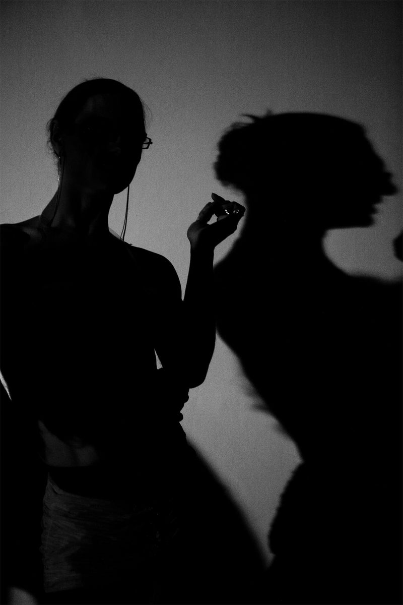 Drag queen in dark moody documentary image.