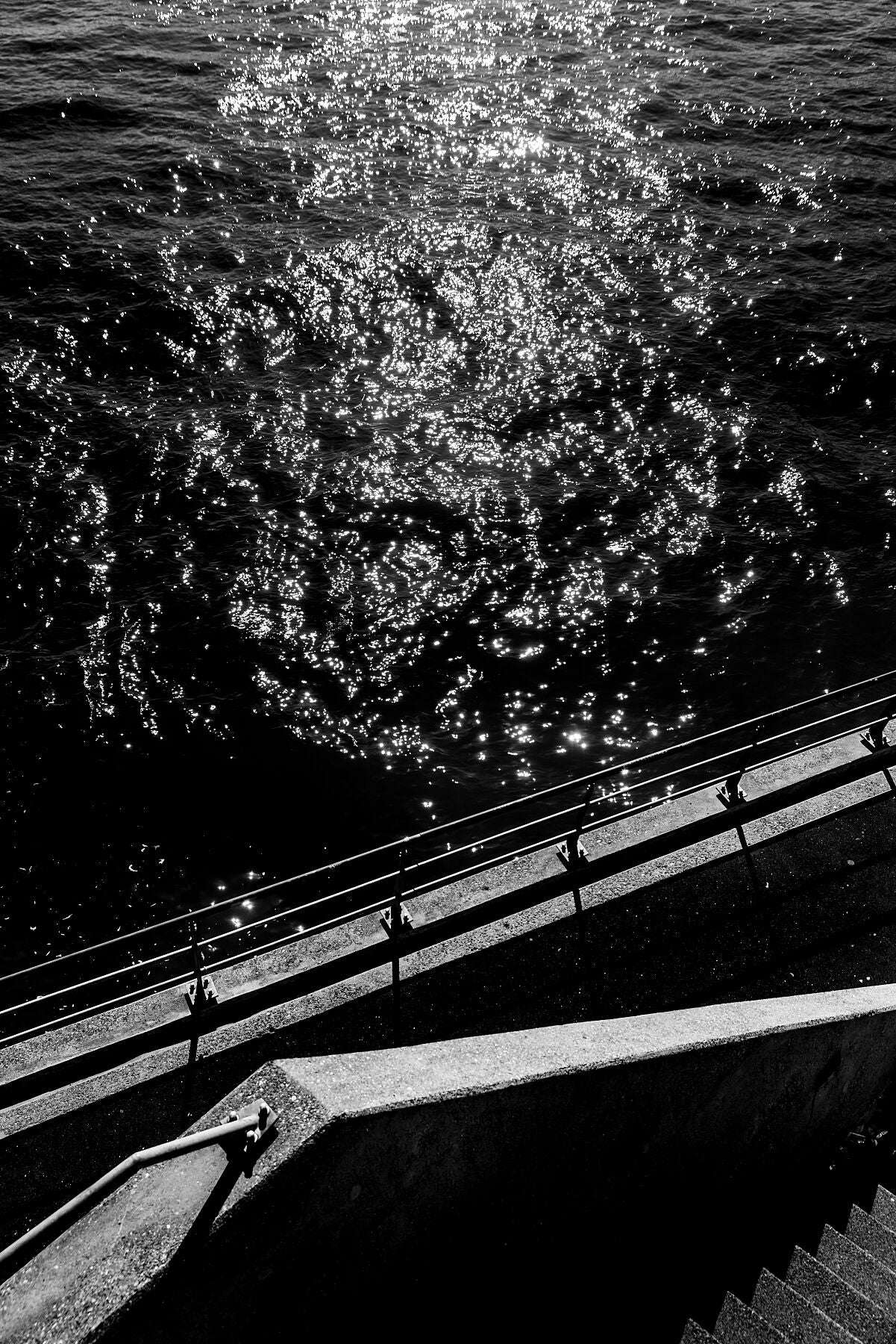 The Nieuwe Maas river in Rotterdam depicted in a fine art black and white style.