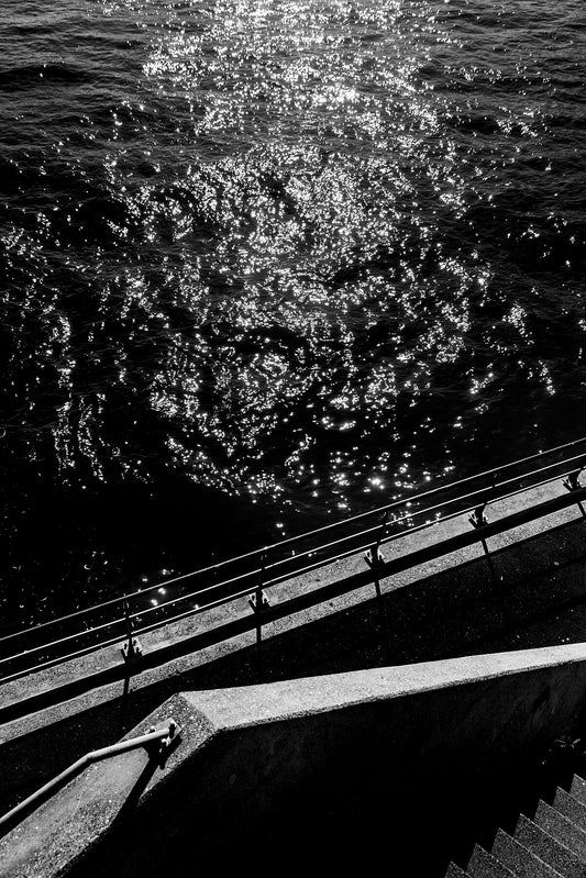The Nieuwe Maas river in Rotterdam depicted in a fine art black and white style.