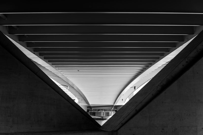 A photograph of the underside details of the Erasmusbrug in Rotterdam