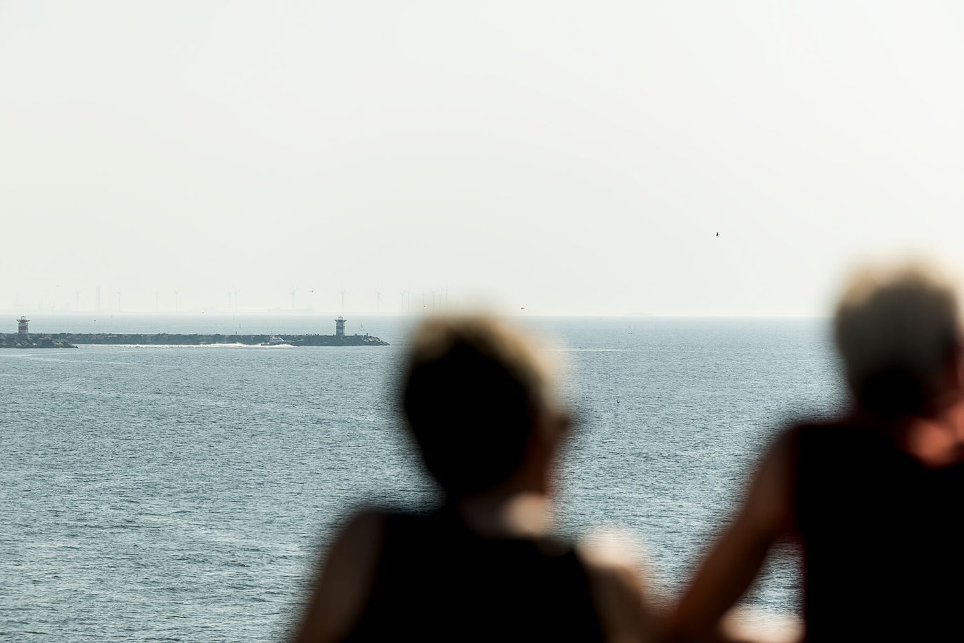 A fine art print of a couple on the Pier at Scheveningen.