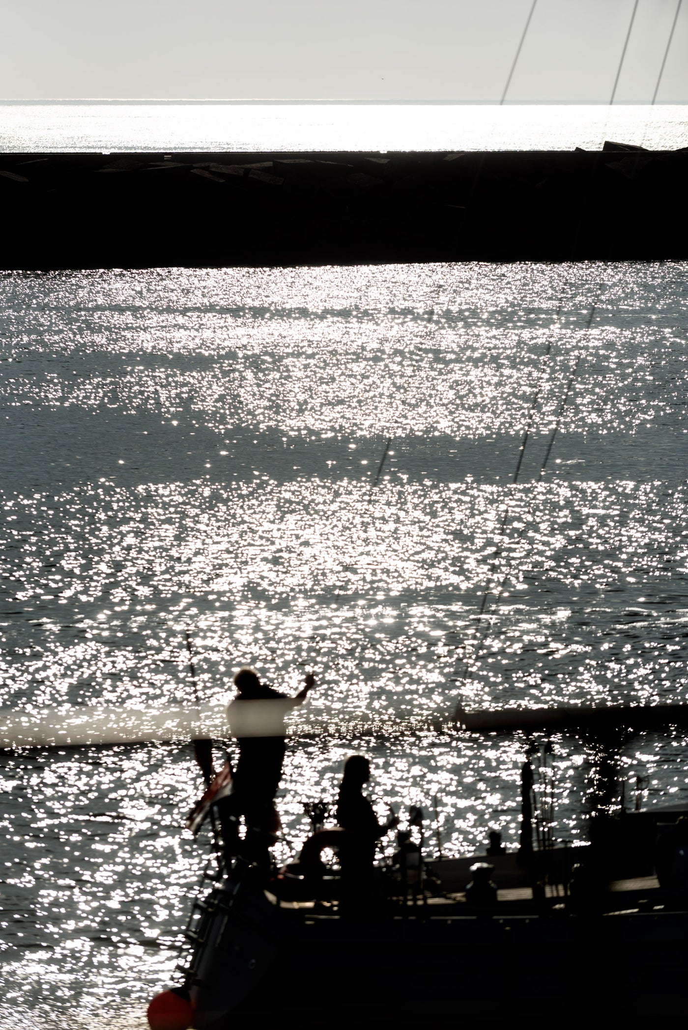 A yacht passes through Scheveningen harbour.