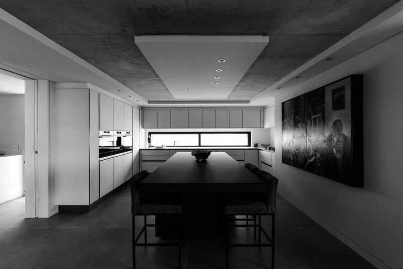 High end interior image featuring modern kitchen.