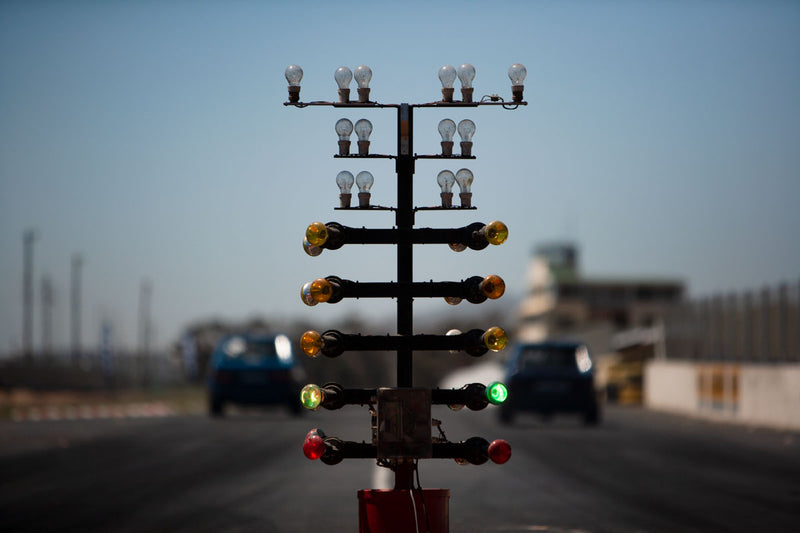 Drag racing christmas lights shot as part of an editorial reportage photo series on amateur drag racing.