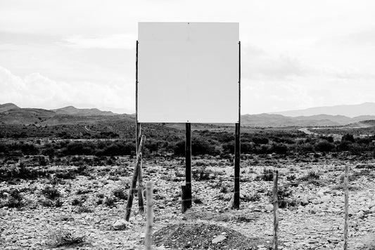 An empty signboard on the road between Barrydale and Ladismith.