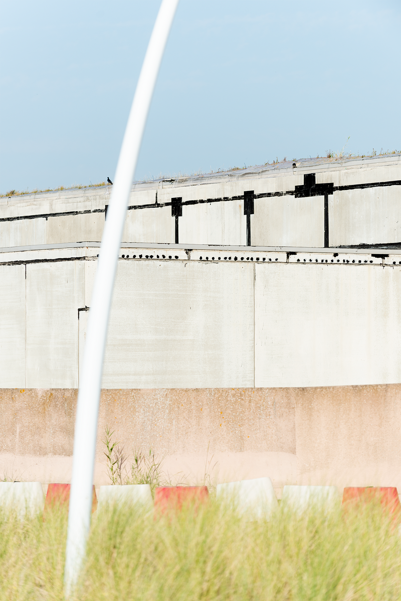 A graphic shot of grass and concrete textures.