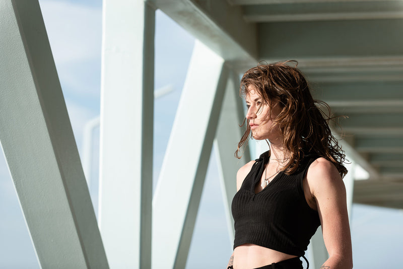 Influencer portrait in urban setting.