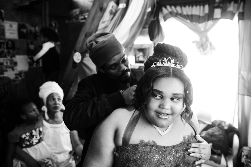 A young woman prepares for her prom night / matric dance.