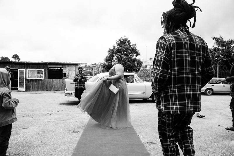 A young woman leaves for her matric dance.