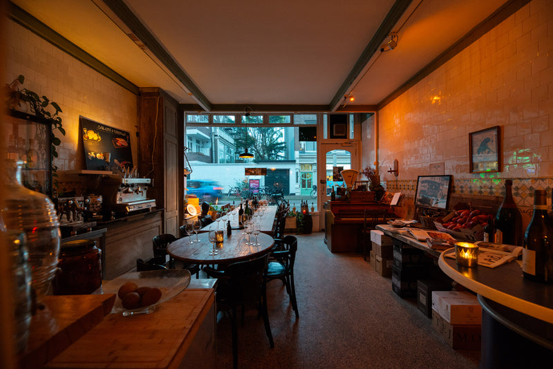 Moody warm restaurant interior scene.