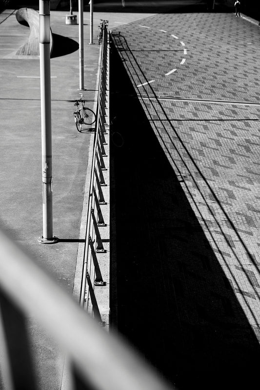 A detail of shadow and pattern shot from the pedestrian walkway that becomes the Erasmusbrug, over the Nieuwe Maas in Rotterdam.