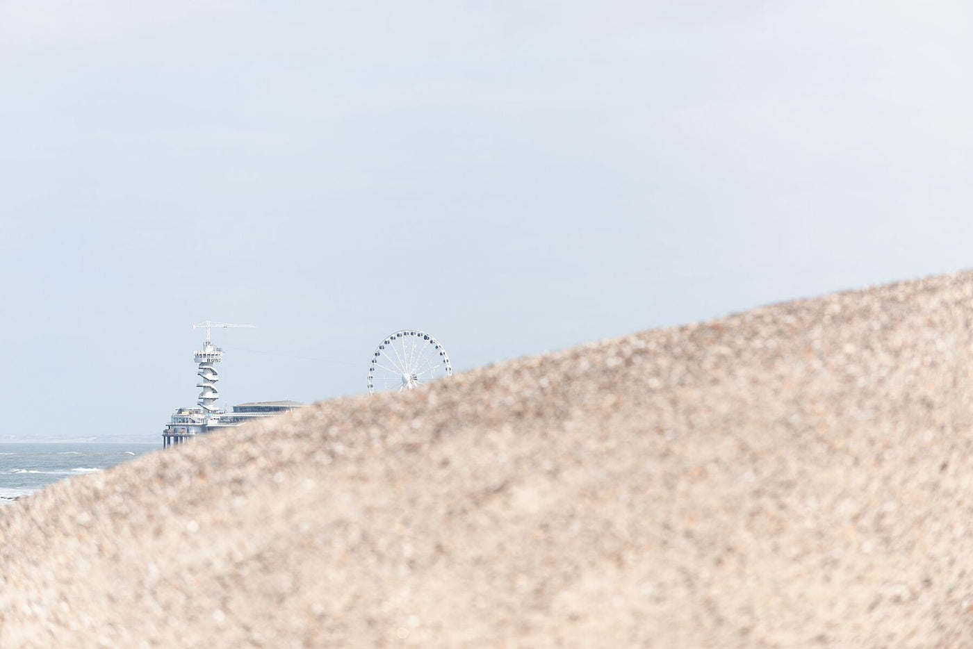 The Pier in the distance. Shot from the walkway at the north sea wall, Scheveningen.