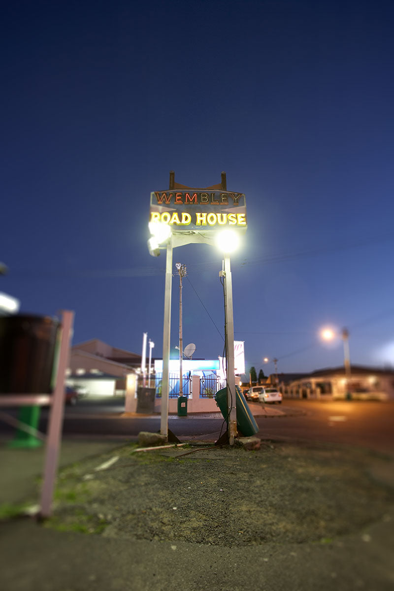 The Wembley Road House roadside signboard.